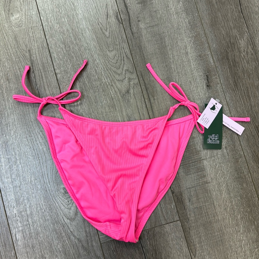 Wild Fable swim bottom size medium fits size 8-10 adjustable ties at hip